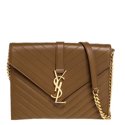 ysl monogram matelassé leather clutch.